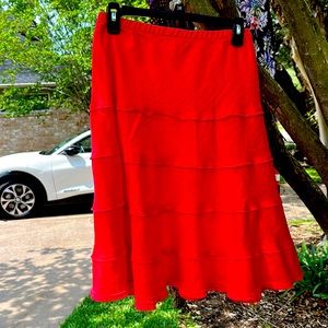 This is actually a coral color. Tiered linen skirt. Soft Surroundings M